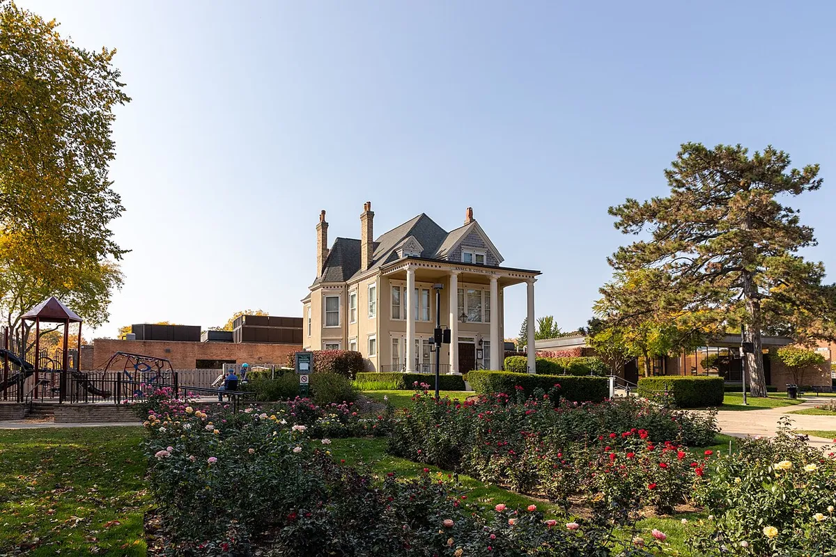 Ansel B. Cook Home in Libertyville, with its columned porch and gardens, photographed in October 2020
