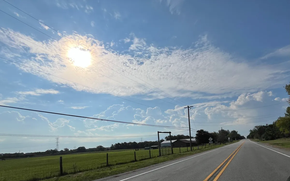 A rural road and fields in Wadsworth, photographed in September 2024.